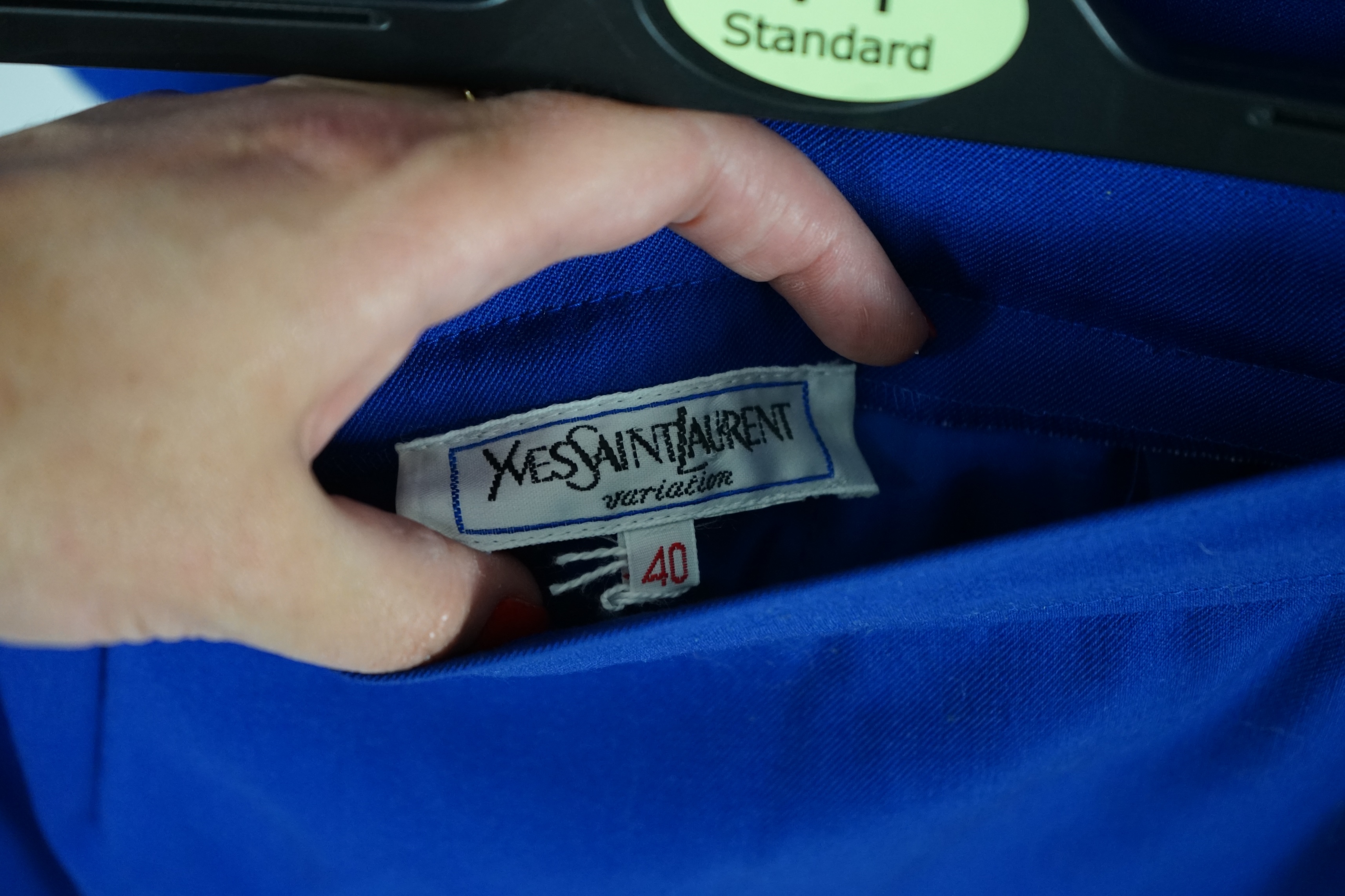 Two vintage Yves Saint Laurent variation lady's skirt suits, royal blue and orange. F 40 (UK 12).Please note alterations to make the waist smaller may have been carried out on some of the skirts. Proceeds to Happy Paws P